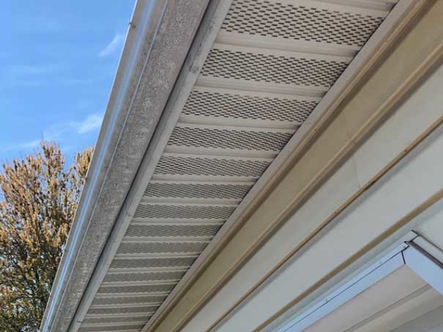 Before_soffit over garage soft wash cleaning